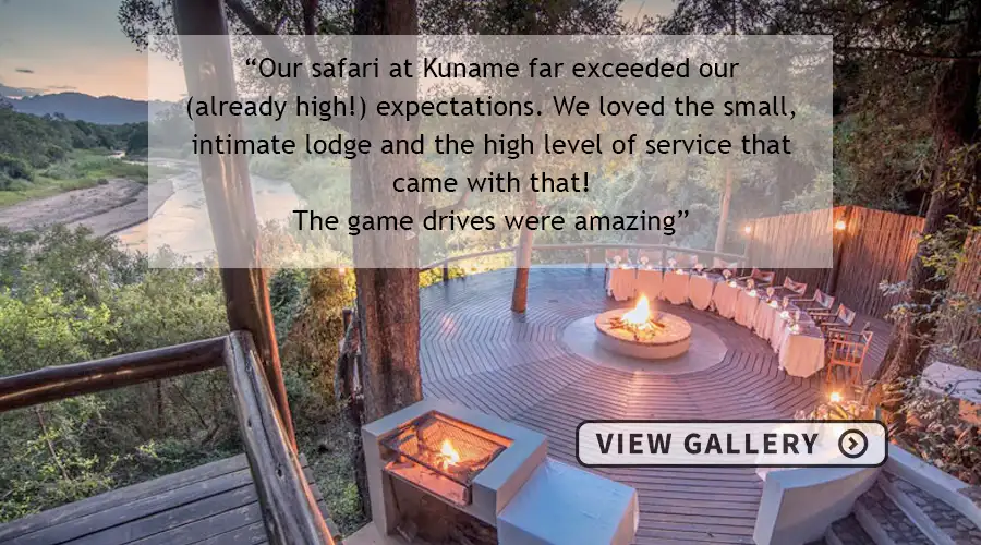 Dining/ Boma area with a fire on a deck overlooking the riverbed